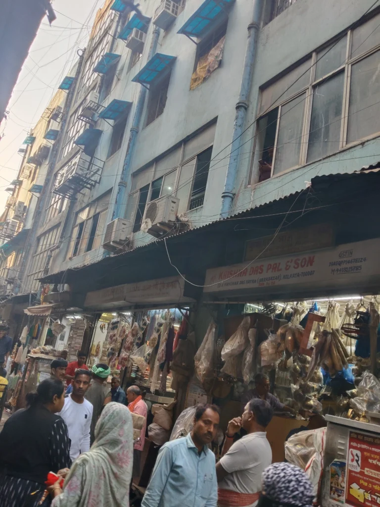 Bustling Manohar Das Katra Road hums with the timeless energy of Burrabazar’s trade and craftsmanship